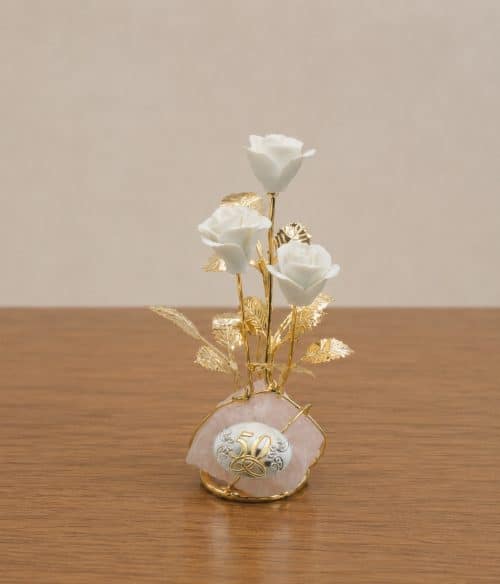 Regalo nozze d'oro con rose decorative
