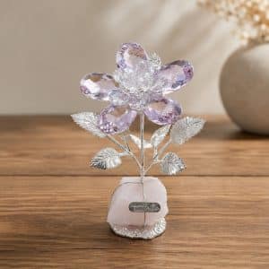 fiore in cristallo su quarzo rosa e argento