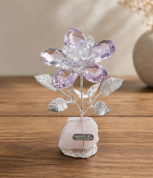 fiore in cristallo su quarzo rosa e argento