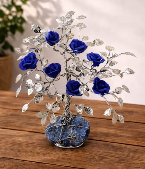 Albero decorativo con rose blu