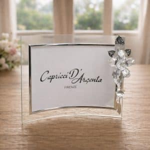 cornice curva con fiore in cristallo