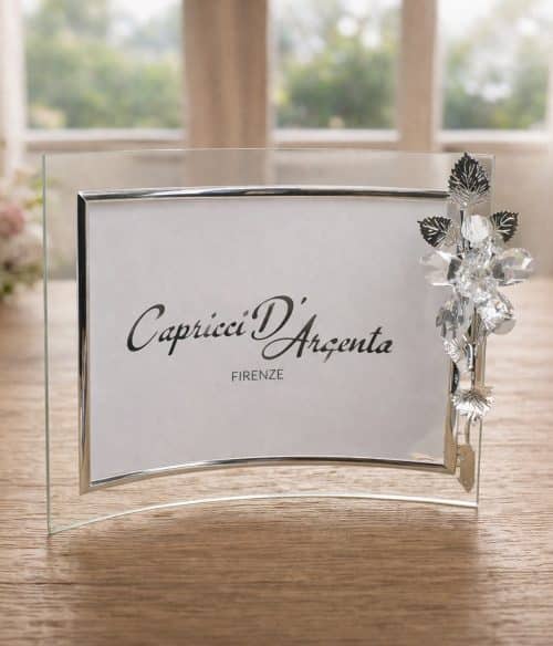 cornice curva con fiore in cristallo